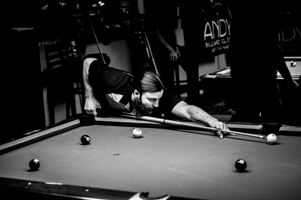 Dr. Dave Schroerlucke playing pool