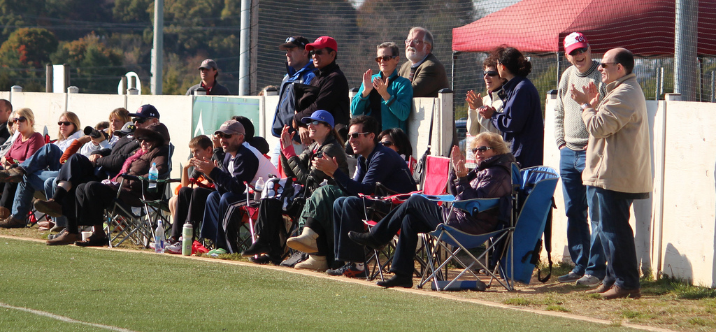 parents cheering at youth sport event