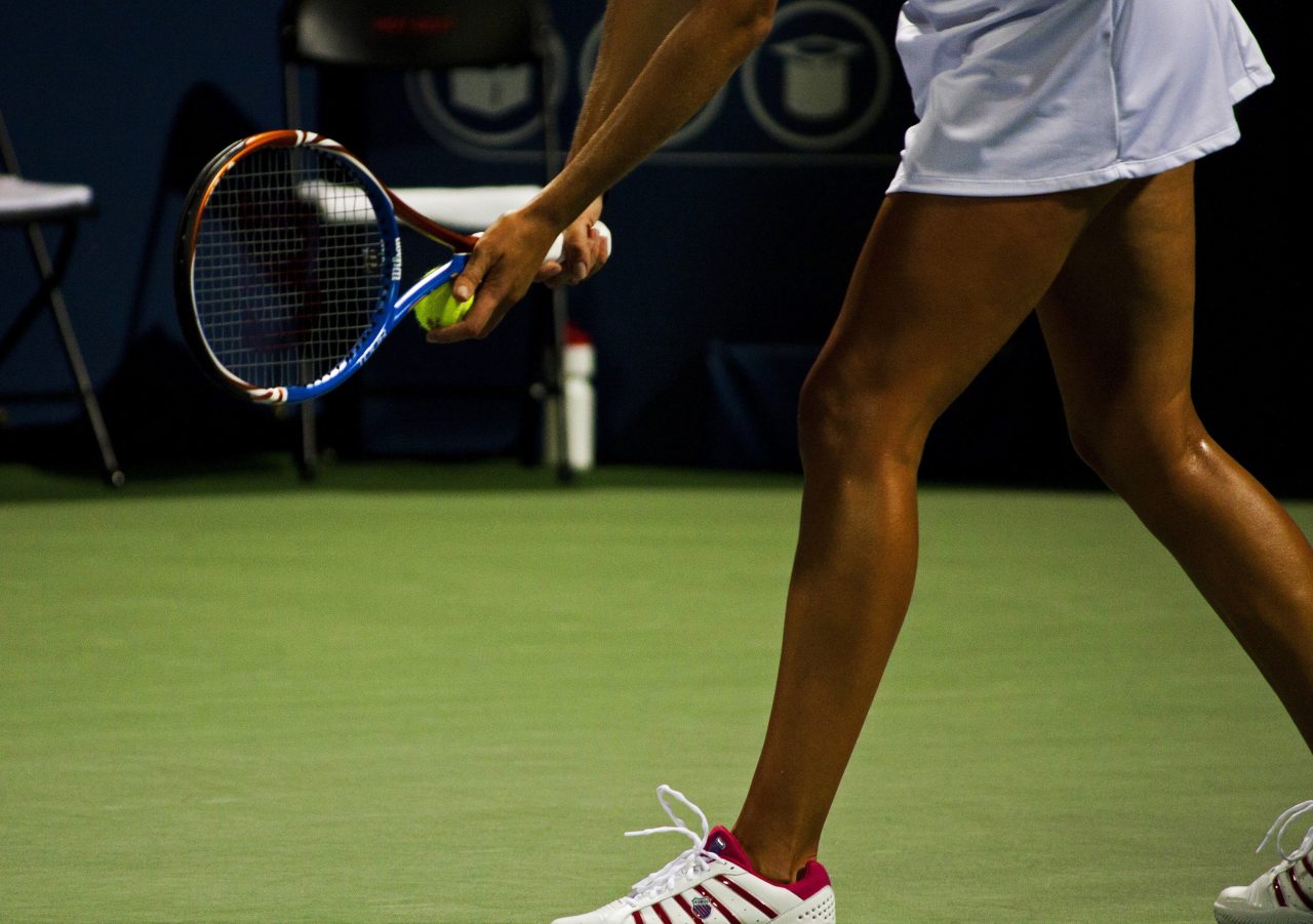 tennis athlete preparing to serve